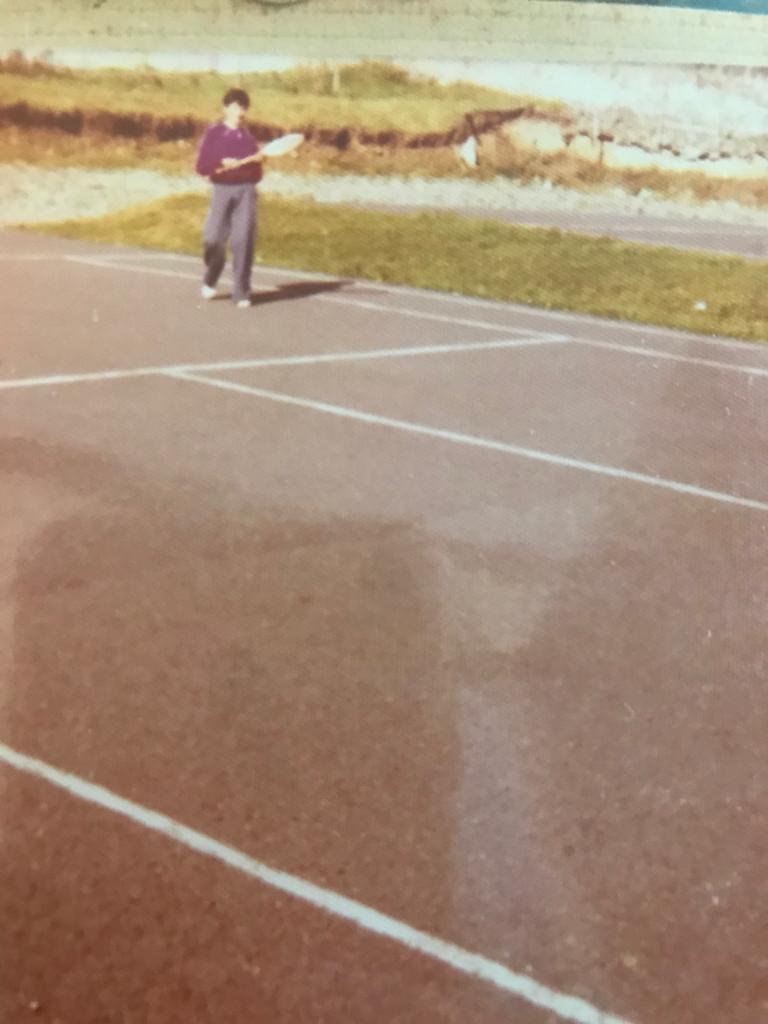 A player crossing the court in the 1970s