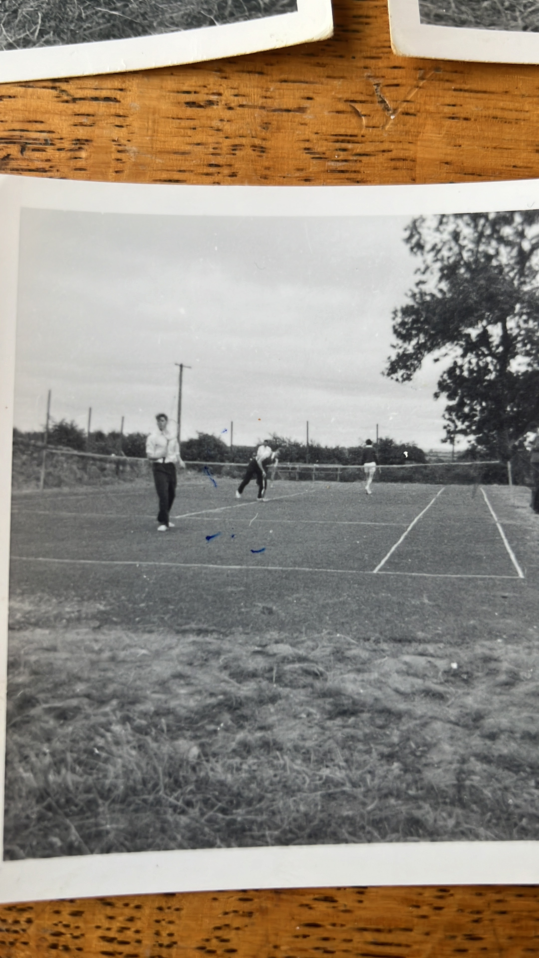 A doubles match on the old grass court