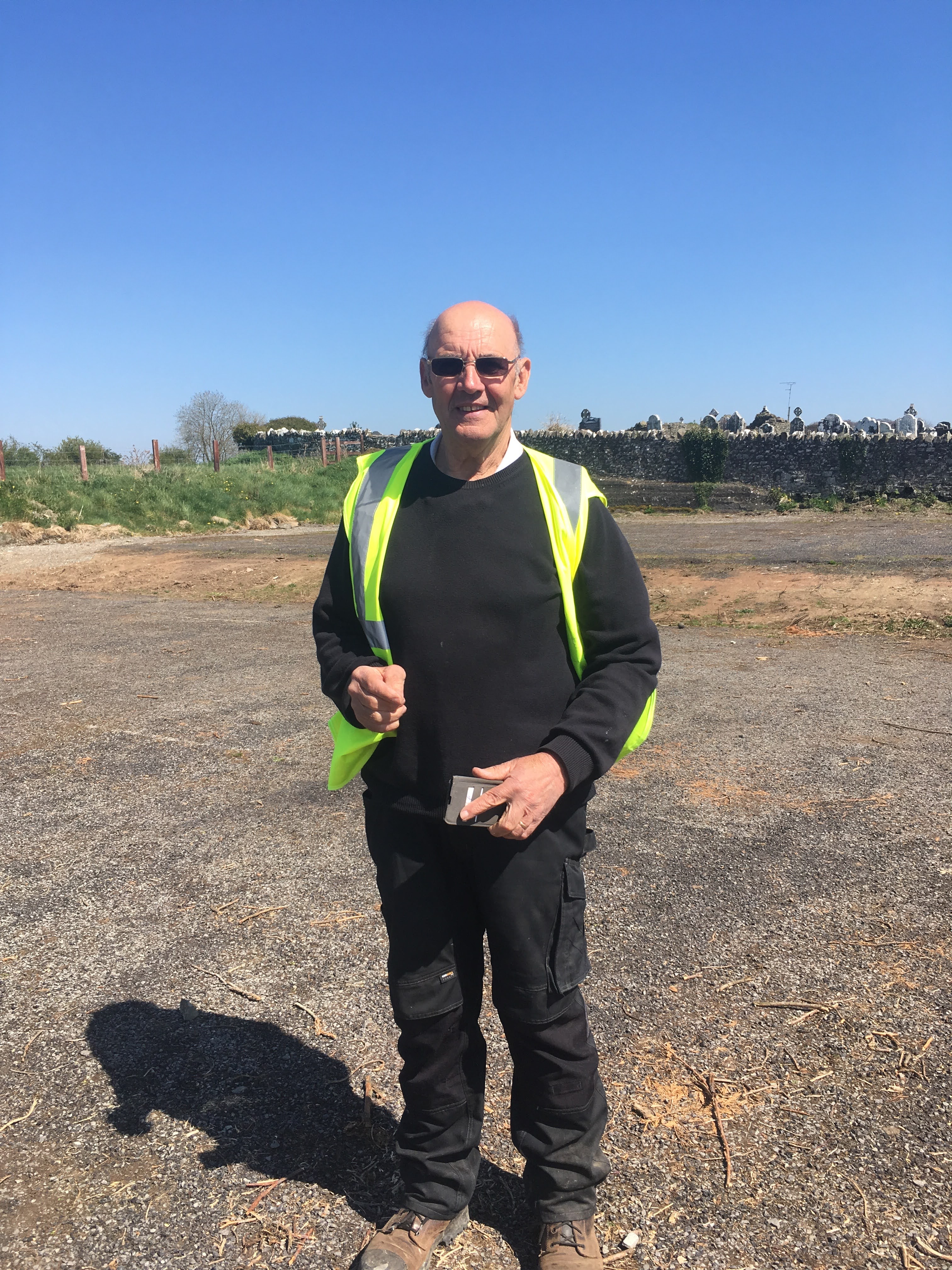 A volunteer on the cleared court site during the revival
